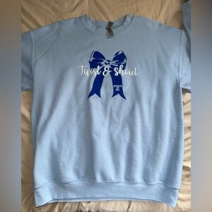 T&S Light Blue Sweatshirt with Blue Bow Design